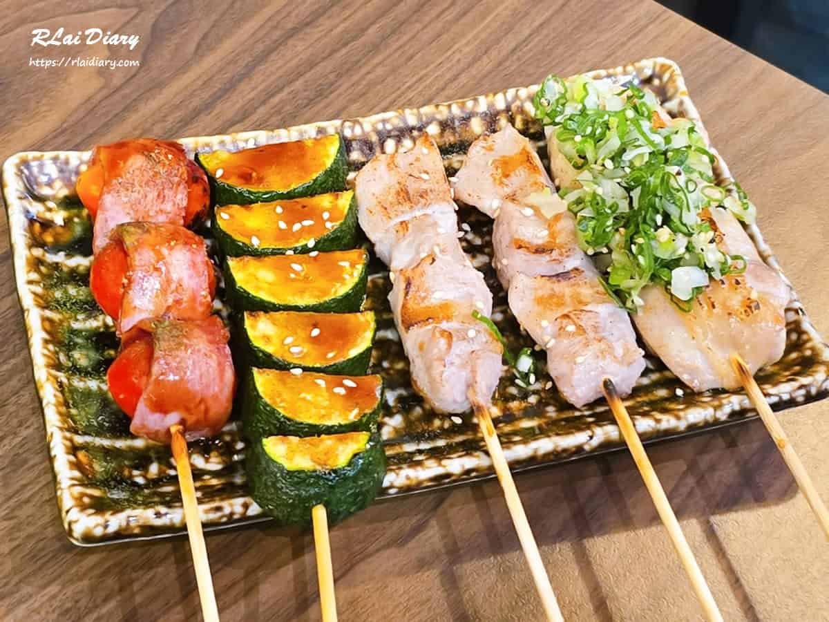 多款串燒拼盤上桌畫面，玖眾串燒食堂永和串燒推薦