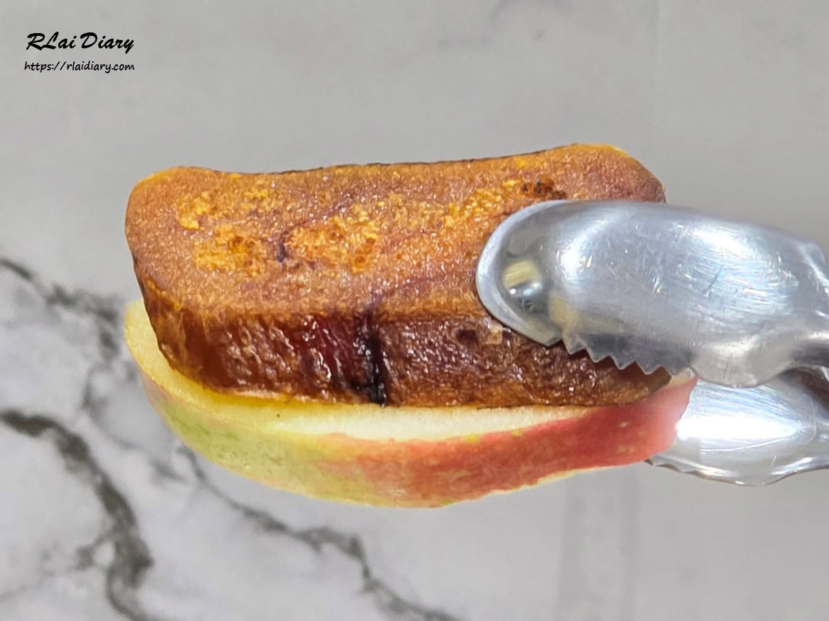 炙燒一口烏魚子 剖面特寫，口感層次與熟成狀態展示