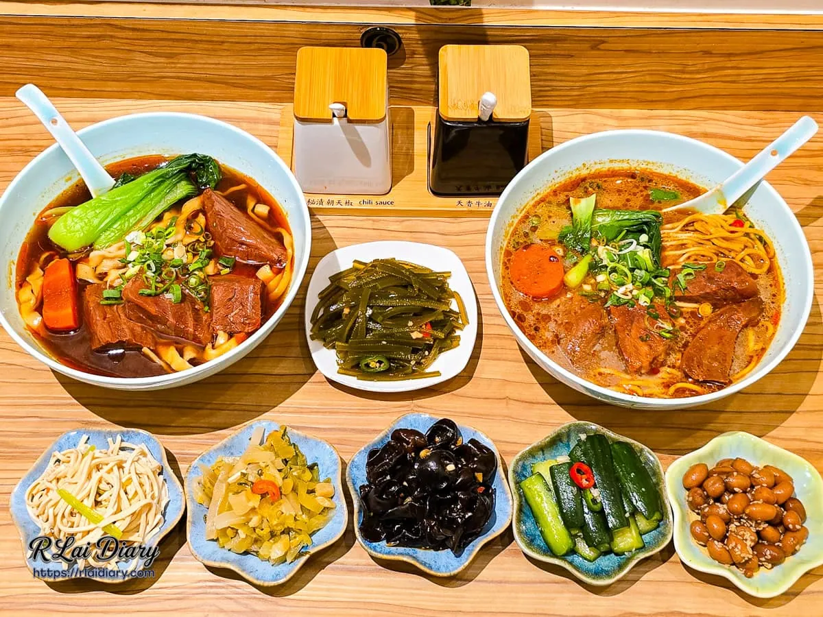 地一牛肉麵豐盛全桌美食合照,包含牛肉麵與各式小菜