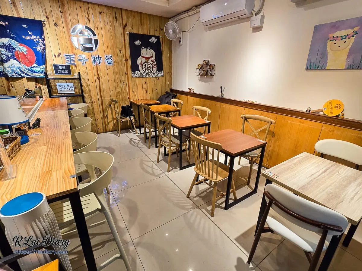 王子神谷台北店內用座位區，日式木質裝潢與舒適的雙人桌椅