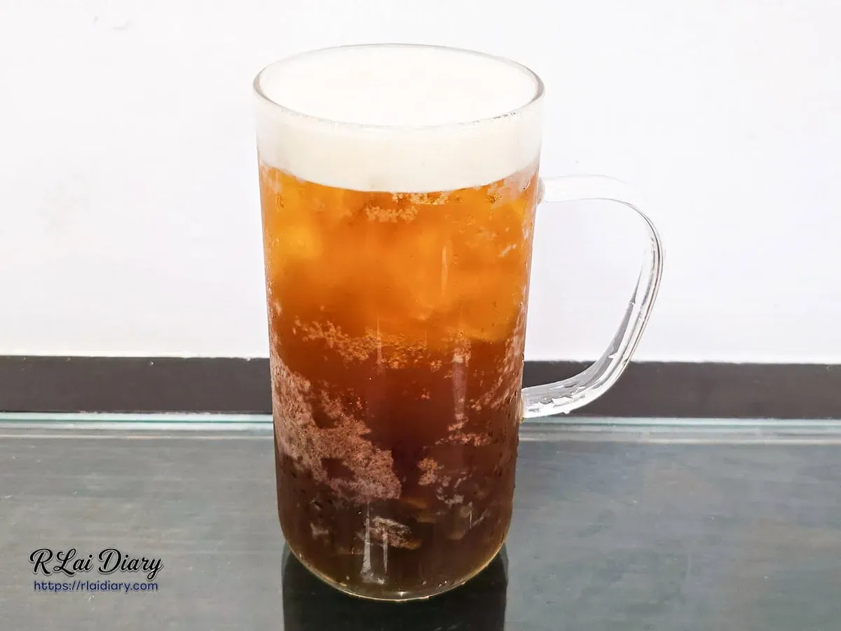 米堤銀行大安店富桂花烏龍搭配手工黑糖粉粿金黃澄澈茶湯全景