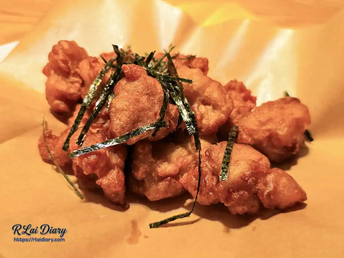 饗夢居酒屋下酒菜：外酥內嫩的日式唐揚雞，撒上海苔絲增添層次