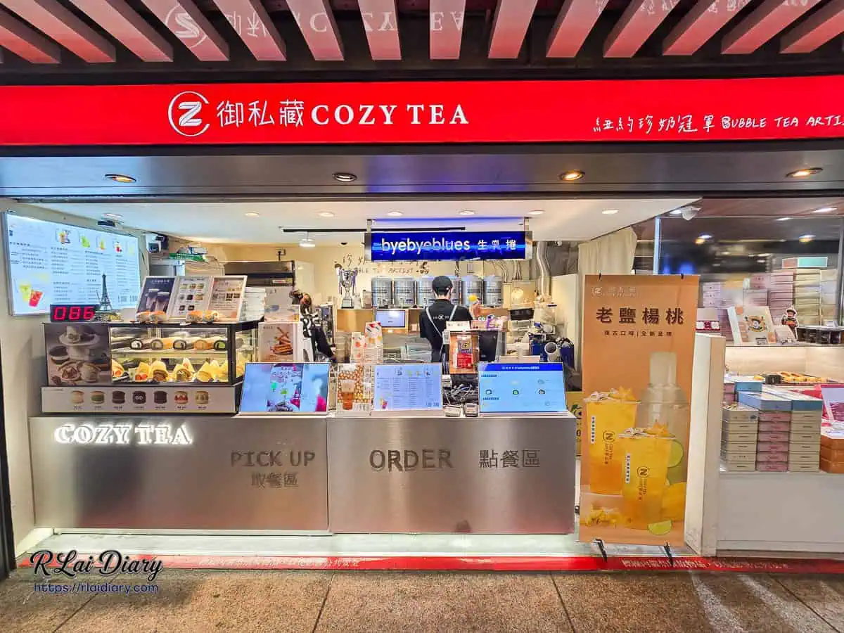 御私藏北車門市外觀：明亮的紅色招牌與不鏽鋼洗鍊櫃檯，展現精品珍奶店的專業感