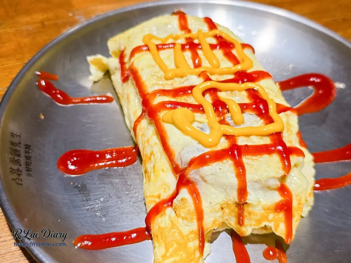 白暮蛋餅先生創意小點薯餅塔俯瞰圖展現精緻醬料圖騰