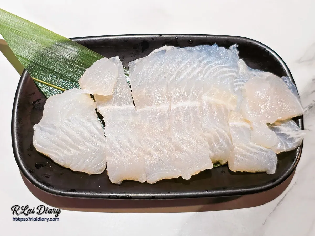 巴沙魚片近特寫，展示無刺且細膩入口即化的純淨肉質