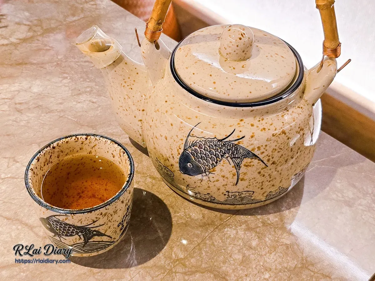 聚食釜開餐奉茶柑橘金萱烏龍與陶壺