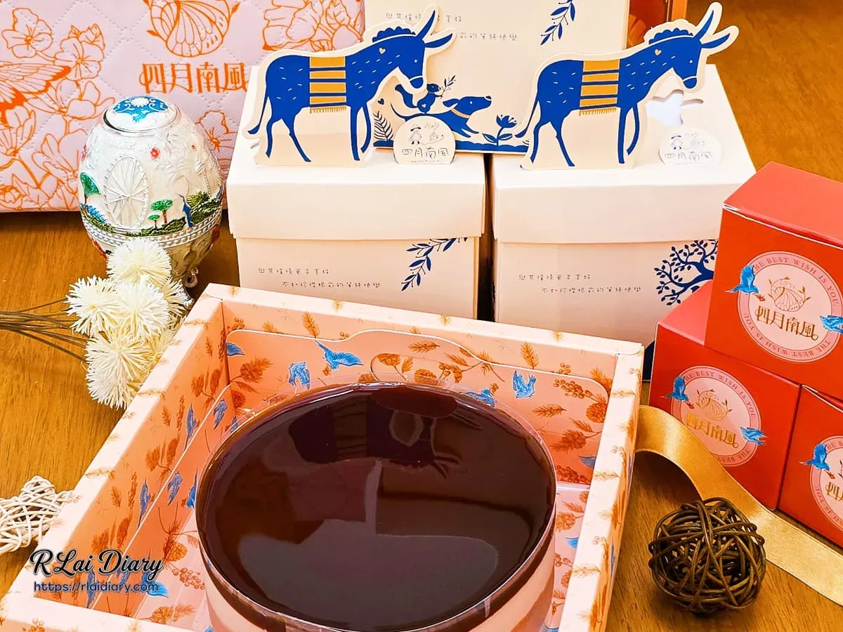 水晶芋頭奶酪蛋糕與精緻包裝盒合影,營造生活儀式感