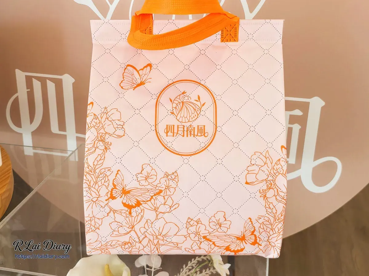 四月南風贈送的粉色蝴蝶碎花不織布保冷提袋設計