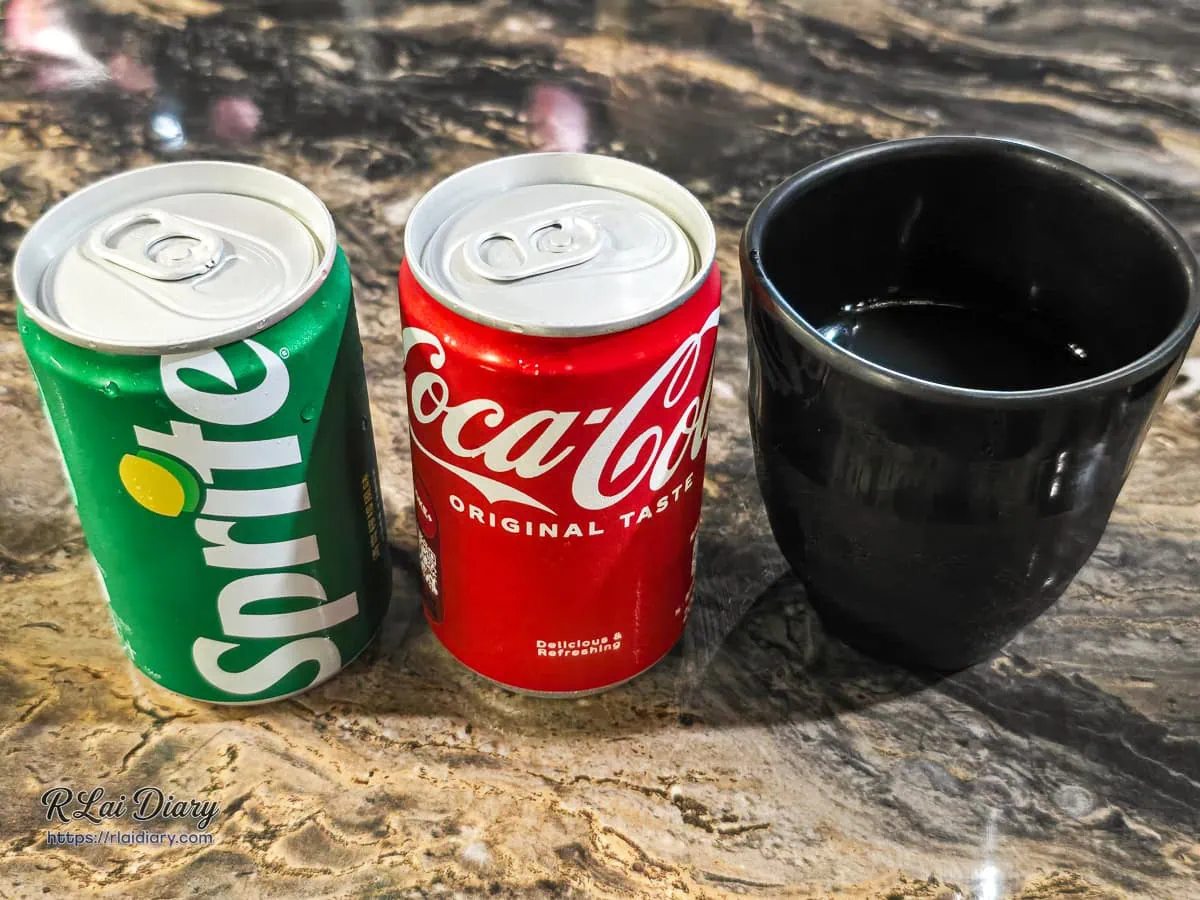 丰明殿自助吧無限暢飲罐裝雪碧與可口可樂