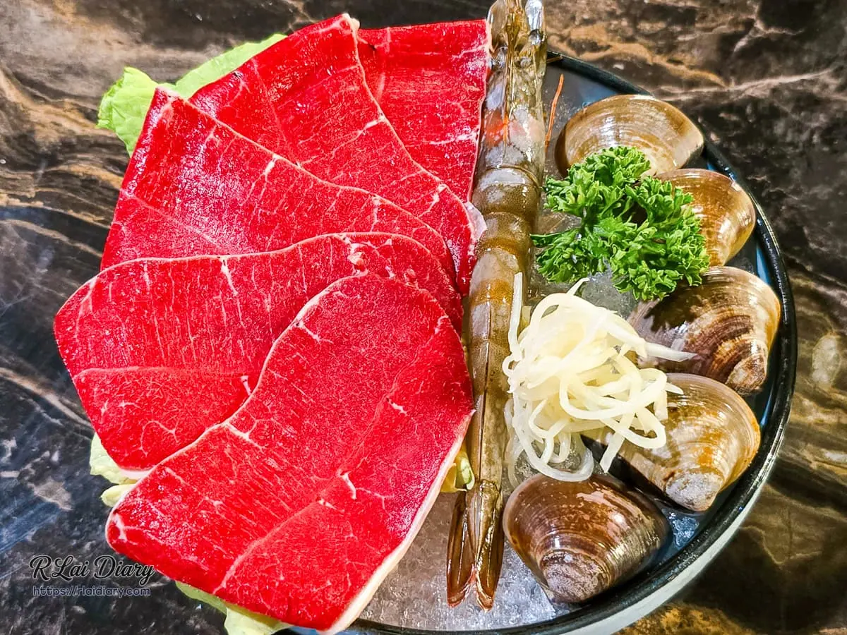 丰明殿活動免費贈送小海陸鮮紅牛肉片與大鮮蝦蛤蜊