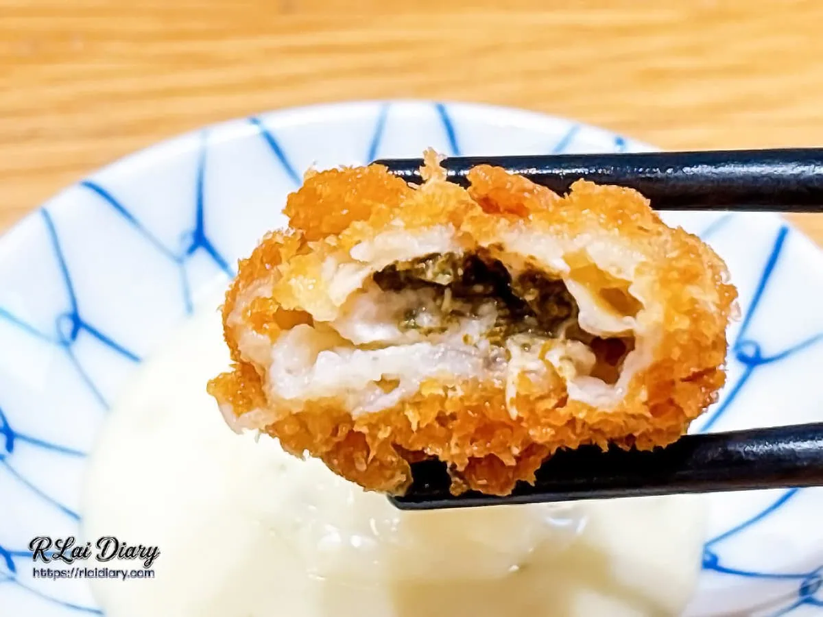 飽滿多汁的炸廣島牡蠣斷面特寫