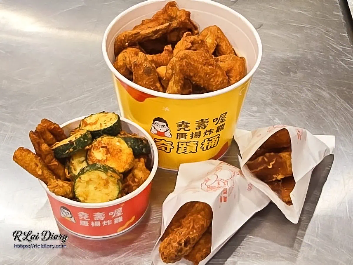 堯壽喔唐揚炸雞台中太原店豐盛餐點合照，包含金黃唐揚雞翅奇蹟桶、爆汁蔬食櫛瓜與純手工蝦捲，北屯區高評價下午茶宵夜推薦
