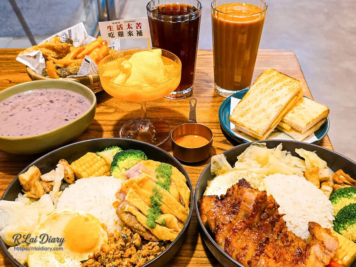 台中勤美有食祿南洋料理滿桌豐盛的平價海南雞飯與風味小食合照